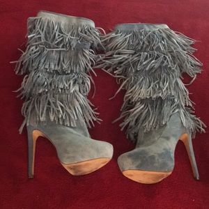 Denim platform fringe boots.